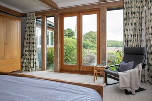 The master bedroom has amazing views to wake up to.
