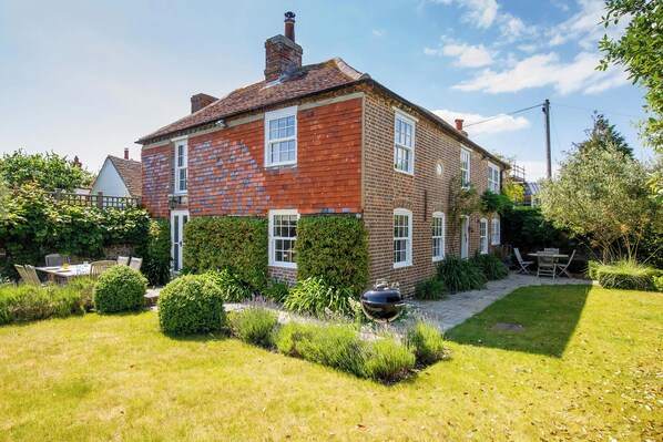 Our beautiful quaint cottage with a relaxing sunny garden