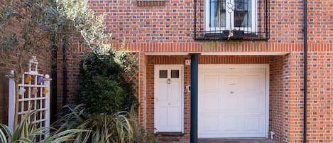 The front of this stylish 3 bedroom Chichester mews with garage