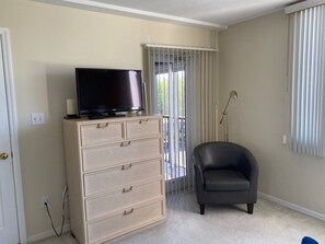 Master bedroom TV and dresser.