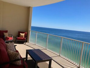 Sit on comfortable patio chairs and enjoy 180 degree views of the ocean