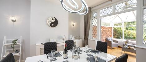 Dining Room seats 6 guests in a modern and stylishly designed atmosphere
