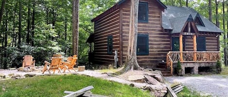 Flat parking for 2 cars, directly in front of cabin. Fire pit.