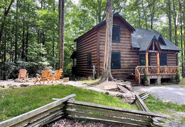 Flat parking for 2 cars, directly in front of cabin. Fire pit.