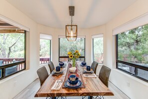 Dining Area Surrounded by Windows