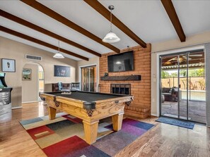 Welcome to Scottsdale Sol!
Game room with pool table, Golden Tee, and Smart TV.