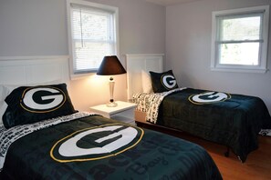 Bedroom 2 features two twin/single beds