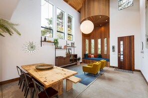 Open space, table, chairs, entrance door