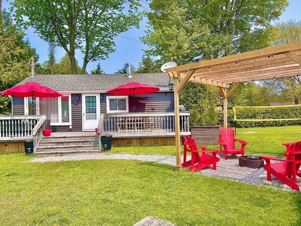 Embrace the warmth of the sun and the joy of outdoor games in the backyard 