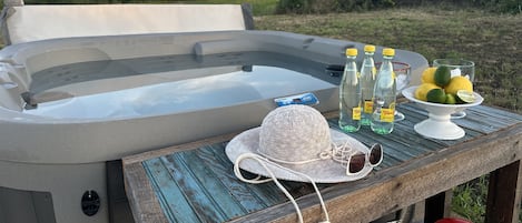 Relax after a long day in our 6-person hot tub!