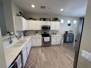 Fully stocked kitchen for all your cooking needs 