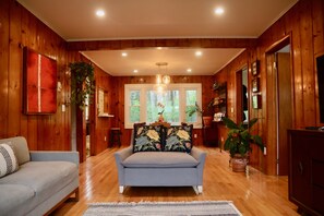 Large sitting area with pull out sofa and smart tv