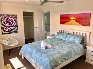 The second bedroom is huge, with deluxe memory foam mattress, high thread count sheets and walk in robe and dressing area. This bedroom has direct access to the large family bathroom