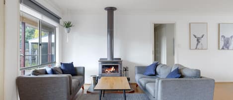 Living room with indoor fireplace 