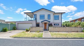 Welcome to your seaside getaway – stylish, spacious, and perfectly located