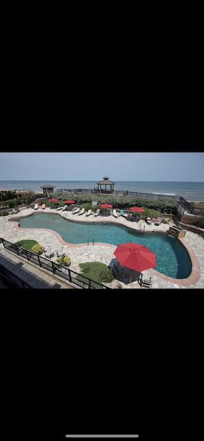 Condo pool between Condo & beach. Outdoor pool available April through October.