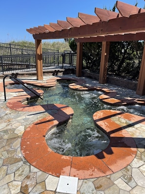 Outdoor hot tub available April through September.