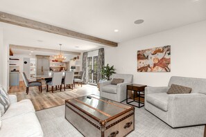 Main living area with dining room, kitchen, and living room