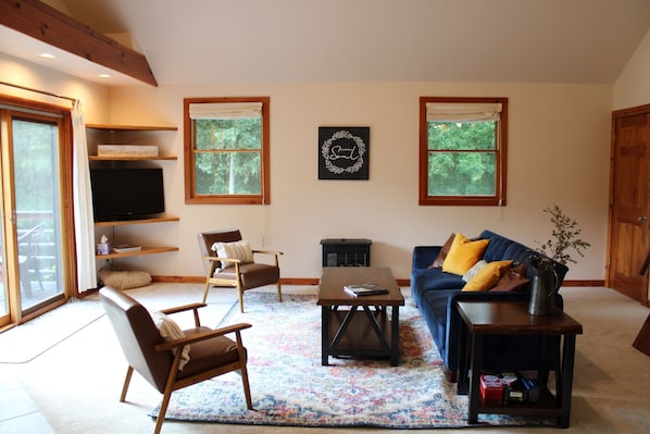 Living Area is spacious and well lit. Furniture is newer and in great condition
