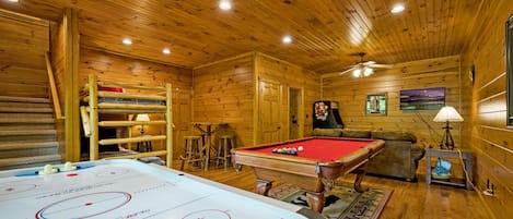 Lower level game room: pool table, air hockey, & multi-cade