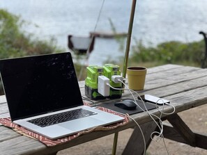 Telling work where you are working from is up to you!  5G reception, wireless hotspot, inverter to power cell phones and laptops,  and rechargeable batteries means we do remote work from the island (shhhhh!).