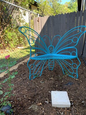 Read a book or take a photo on this butterfly chair!