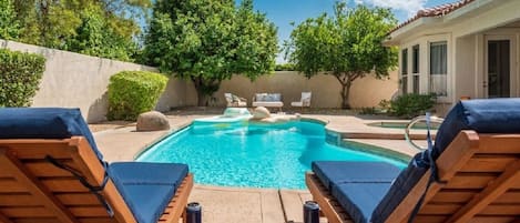 Backyard pool with jacuzzi