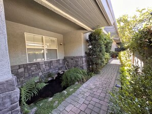 Lighted and paved entry to the home