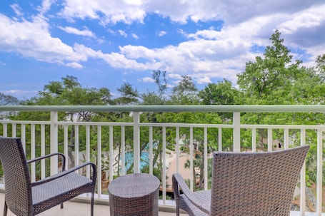 Private balcony overlooking complex pool