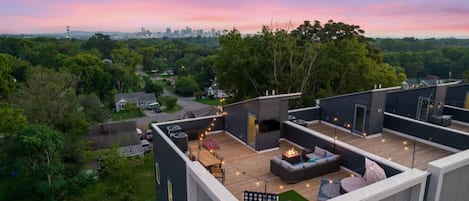 Enjoy the rooftop with a game of giant connect 4, cornhole, or relaxing by the fire with some TV!