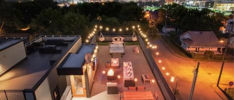 Fire pit, grill, ping pong, and a smart tv with various seating options makes our rooftop stand out from the rest!