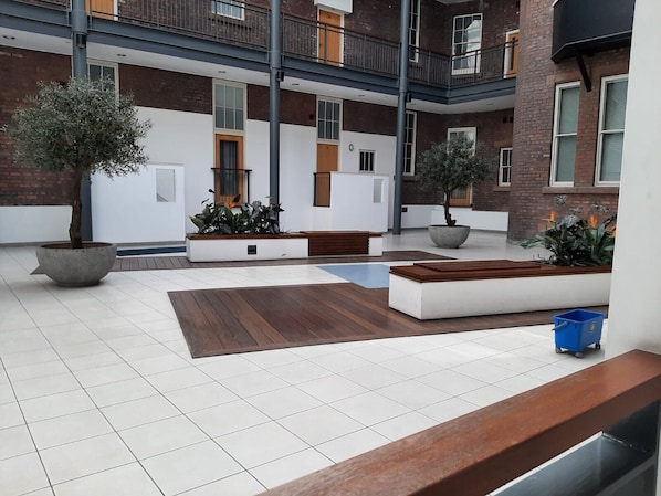 Beautiful Atrium for Guests to enjoy - have a BBQ, drinks and relax
