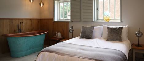 Decadent Verdigris copper bath in the King Bedroom