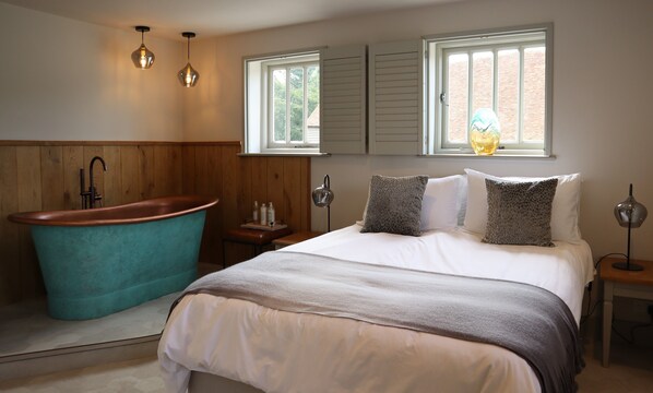 Decadent Verdigris copper bath in the King Bedroom