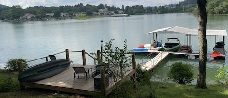 Swimming deck, Crescent SUP boards, 4 kayaks, adult/child vests.  H2O lounges, 