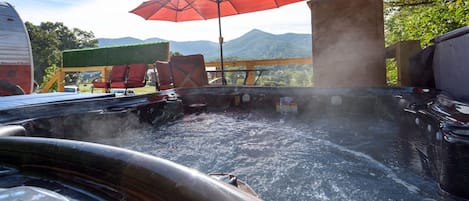 View of the mountains from your seat in our relaxing hot tub