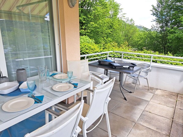 Table, Furniture, Property, Plant, Tableware, Chair, Dishware, Outdoor Furniture, Interior Design, Wood