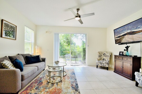 Living room area with pullout bed Huge 70 inch TV