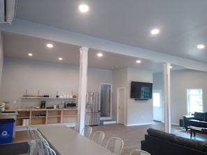 Secondary kitchen w/ sink, 36" refrigerator, 2nd dishwasher w/ 20ft. countertop.