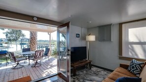 Open concept living in our studio apartment. Opens up to a great outside space!