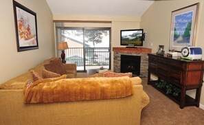 Indoors, Screen, Furniture, Couch, Living Room