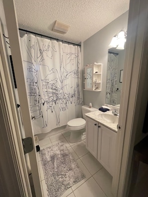 Guest Bathroom with Tub and Shower