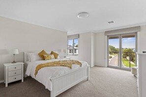 Beautiful queen bedroom with walk in robe