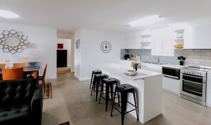 Showing open plan of kitchen, living and dining area.