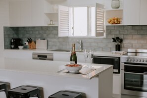 New kitchen with all the appliances including a Nespresso pod machine.