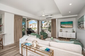 Living room with access to the private lanai