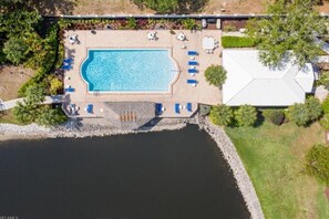 Pool, cabanas and clubhouse with kitchen, bathrooms and grills