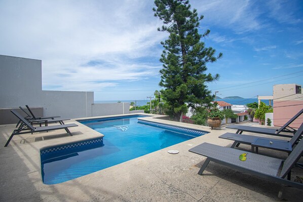 Common Area Pool with Lounge Charis