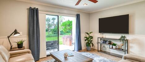 The sliding door leads straight into the living room, bringing in plenty of natural light.