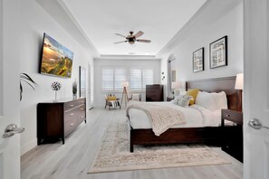 Large master bedroom retreat with private door out to pool and backyard
